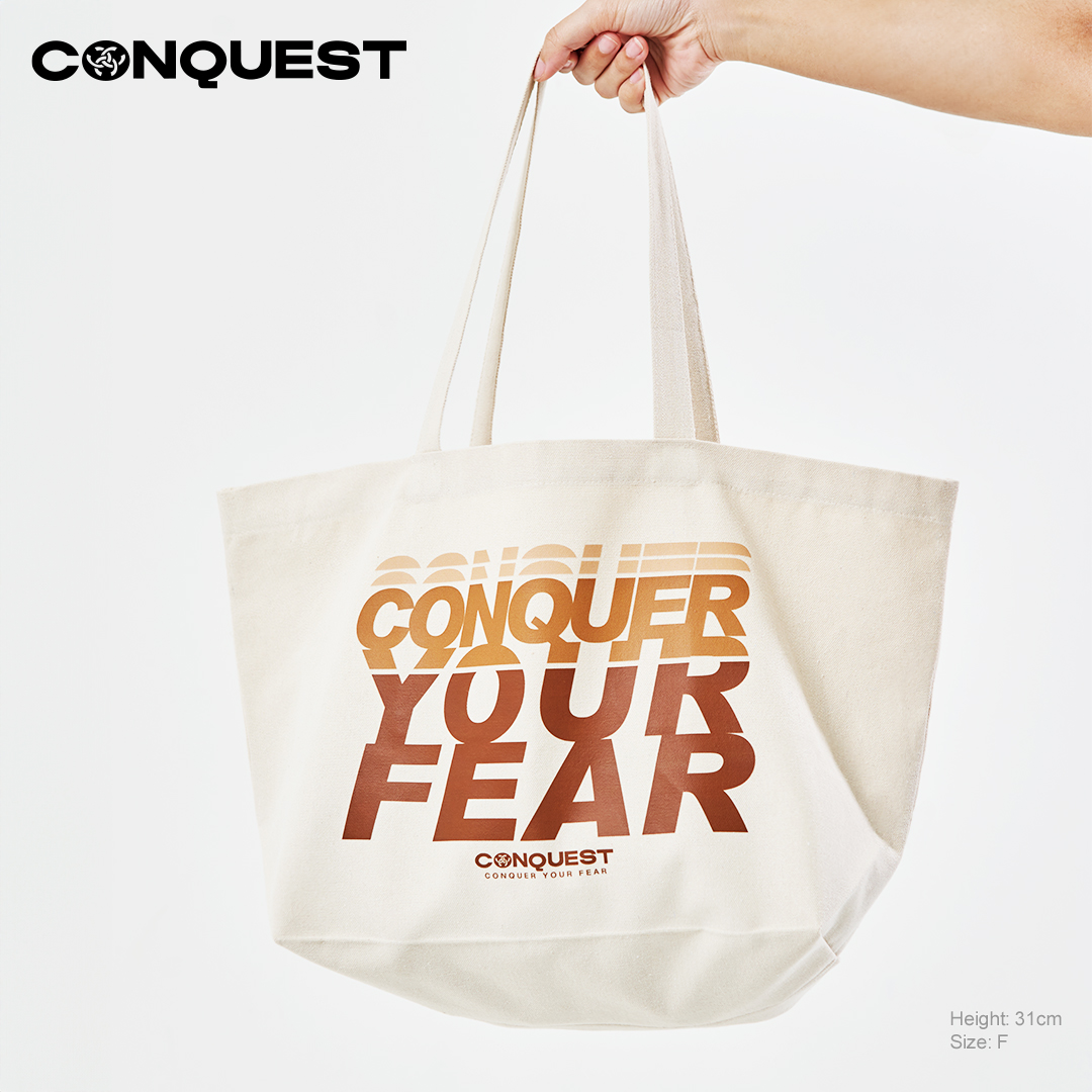 CONQUEST CONQUER YOUR FEAR TOTE BAG IN BROWN AND BEIGE FRONT VIEW