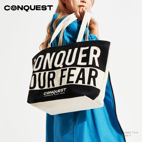 CONQUEST TWO TONE CONQUER YOUR FEAR TOTE BAG IN BLACK AND BEIGE COLOUR