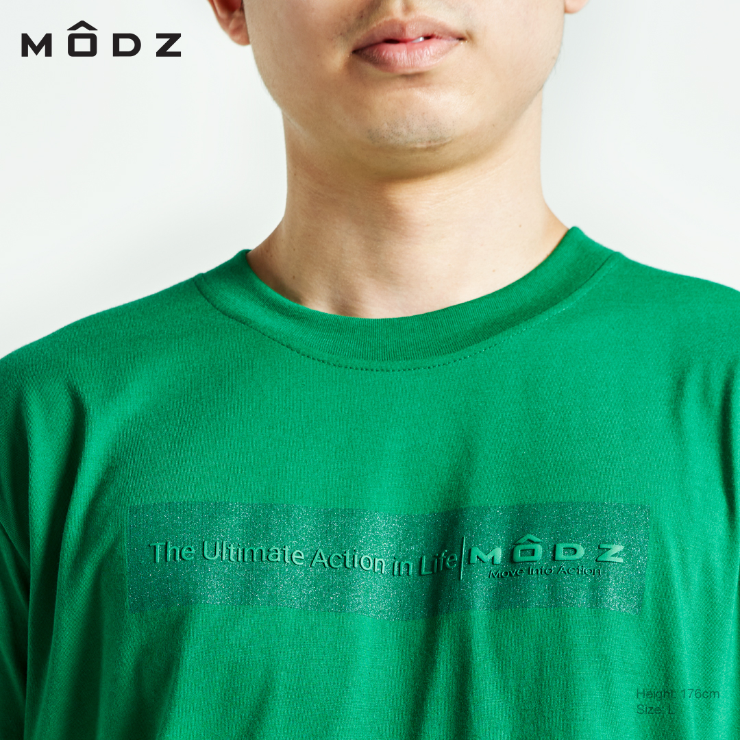 MODZ MEN THE ULTIMATE ACTION IN LIFE TEE SHIRT IN GREEN FRONT DETAILS